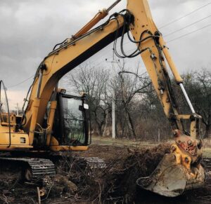 Excavator hauling dirt
